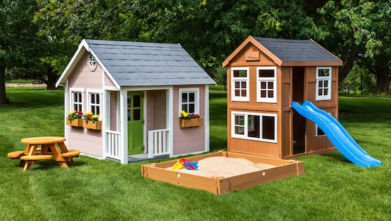 Mid-range DIY kids playhouses—two creative wooden playhouses with slide, sandbox, picnic table, flowers, and sturdy design