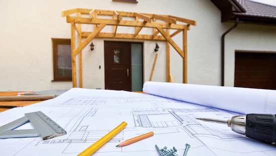 DIY door awning plans and homemade door awning blueprints, showing clear technical drawings, wooden frame, and tools in use