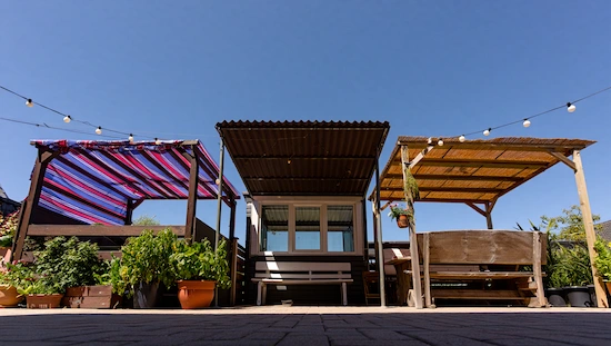 DIY Awning Ideas with three unique homemade awning designs, featuring colorful fabric, corrugated metal, and rustic wood frames.